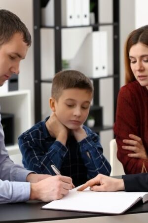 "Young couple discussing financial planning and family law matters together"