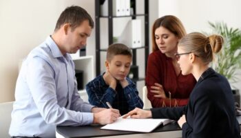 "Young couple discussing financial planning and family law matters together"