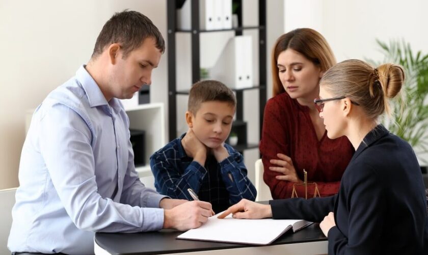"Young couple discussing financial planning and family law matters together"