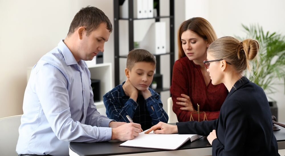 "Young couple discussing financial planning and family law matters together"